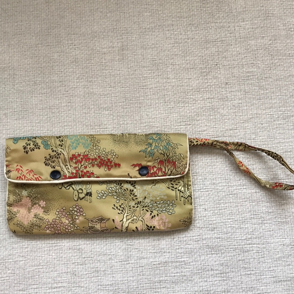Chinese gold satin wristlet